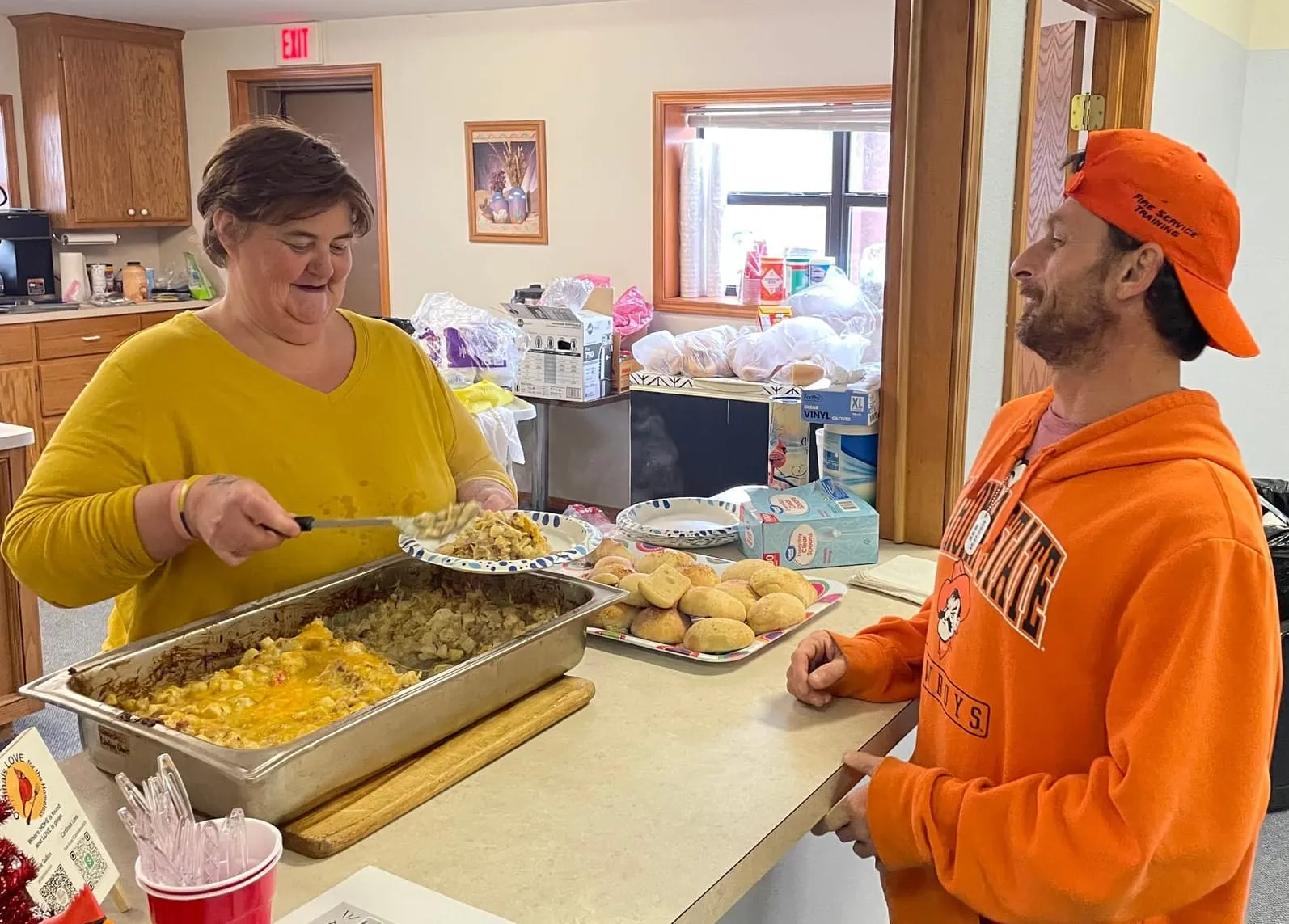 Stephanie Gallion serving a meal at Cardinals Love for the Homeless